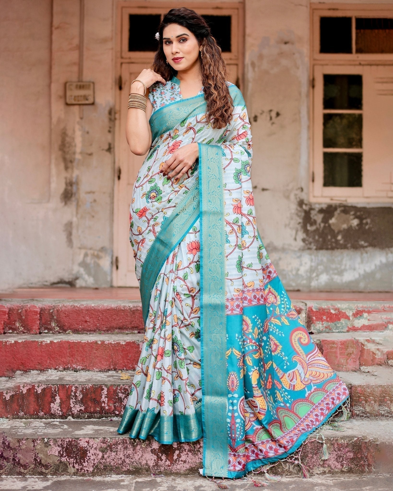 Sky Blue Tussar Silk Saree with Multicolor Floral Design and Zari Paisley Border