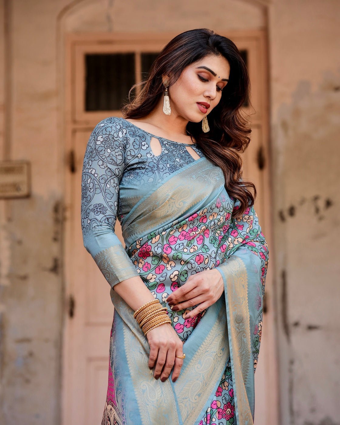 Sky Blue Tussar Silk Saree with Floral Weaves and Ornamental Pallu Design