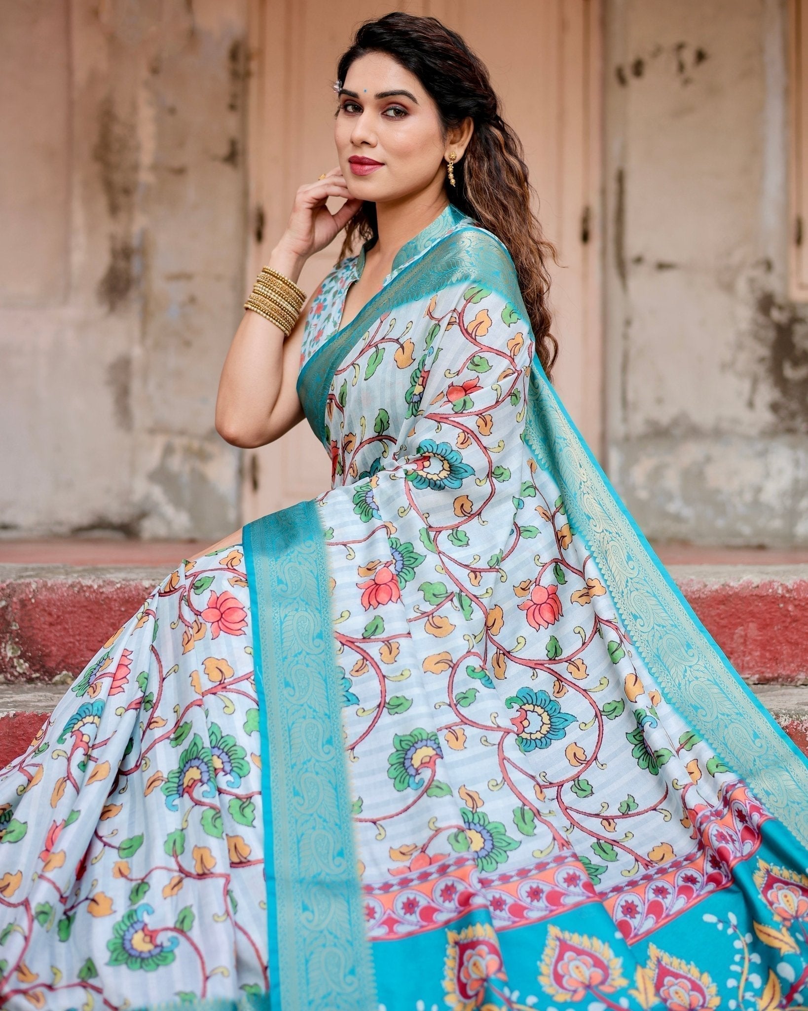 Sky Blue Tussar Silk Saree with Multicolor Floral Design and Zari Paisley Border