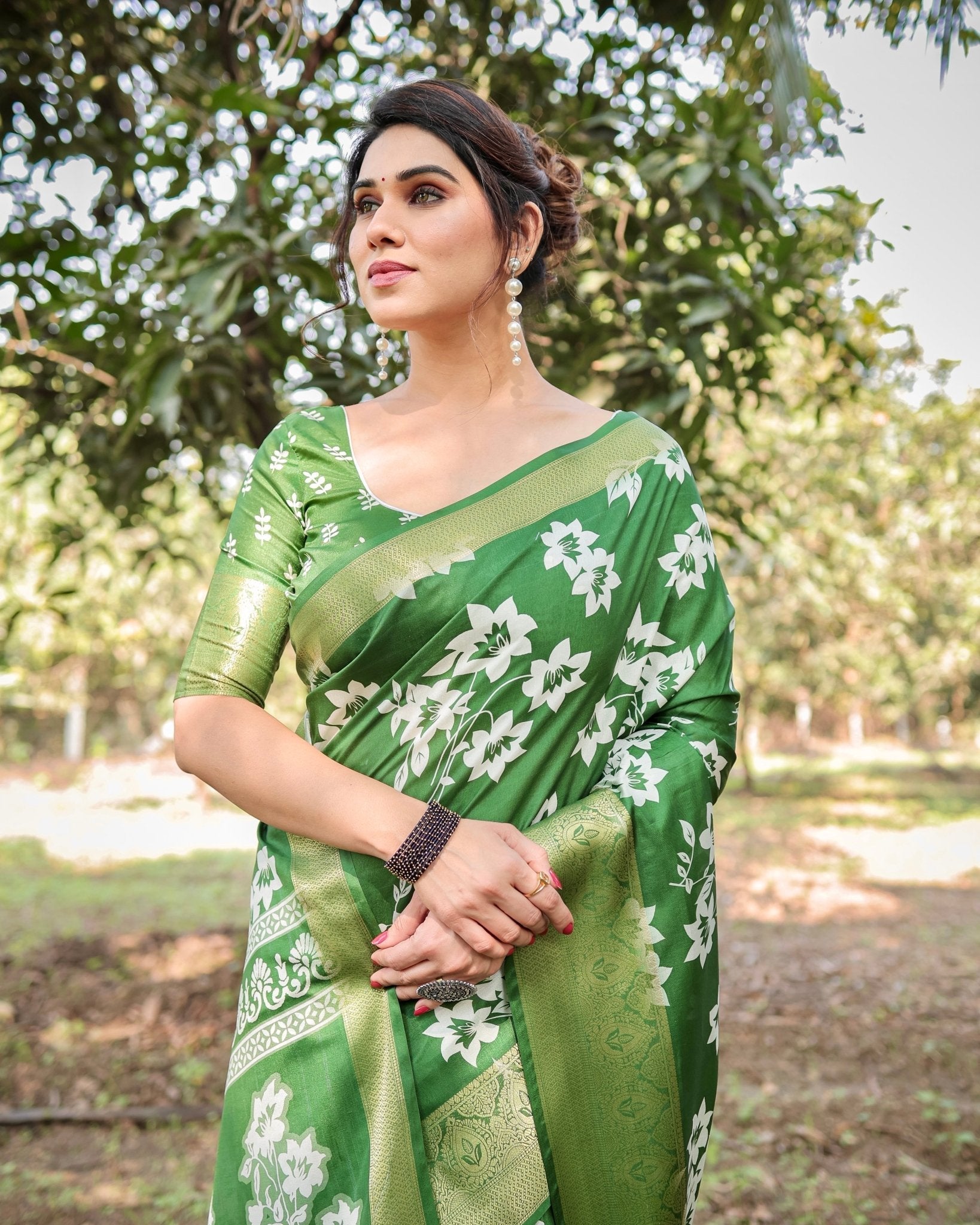 Enchanting Green Tussar Silk Saree with White Floral Prints and Zari Border