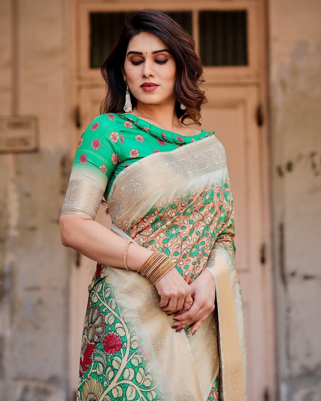 Emerald Green and Gold Tussar Silk Saree with Floral and Ornamental Motifs