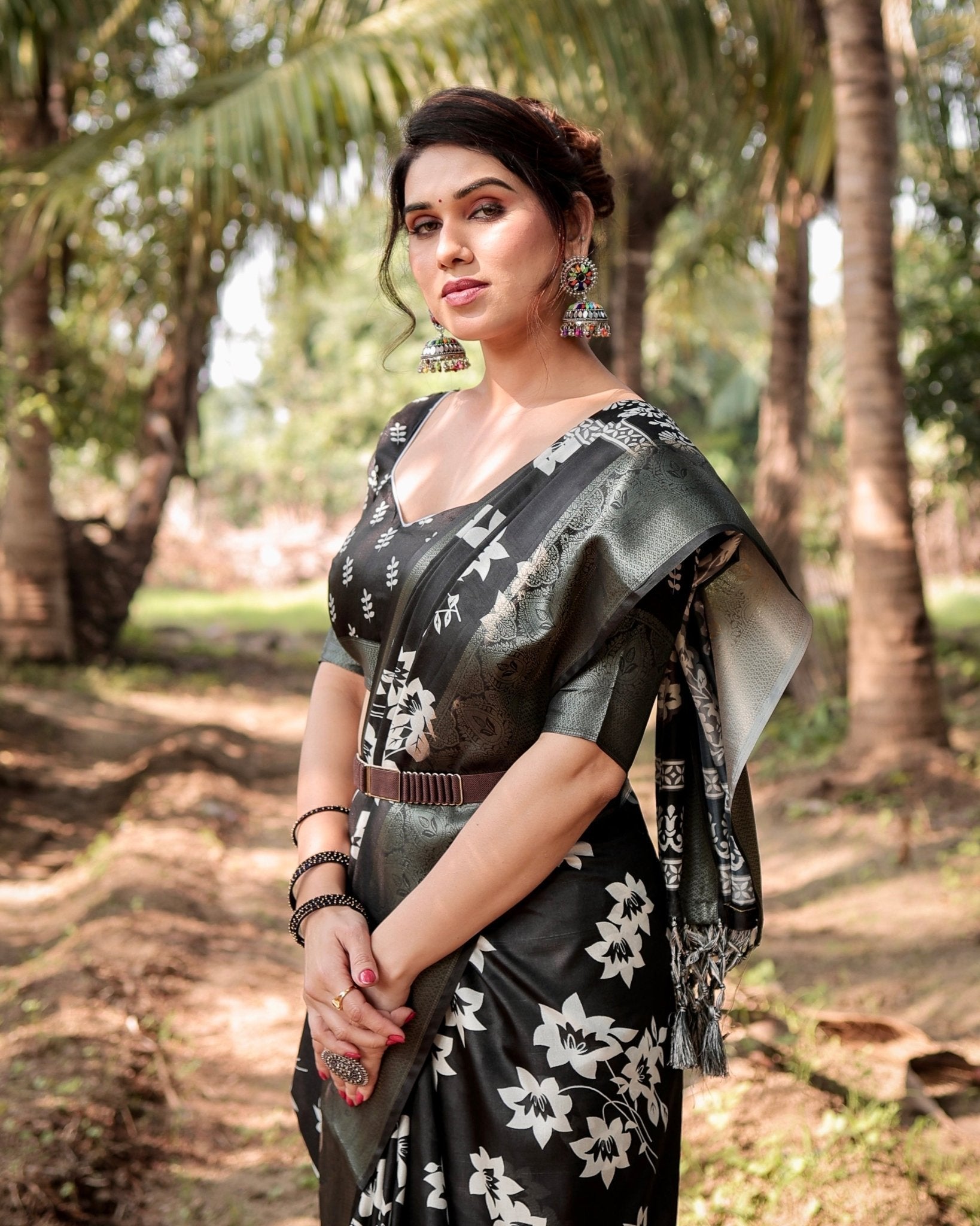 Elegant Black Tussar Silk Saree with Zari Embellished Border and Bold Floral Pallu