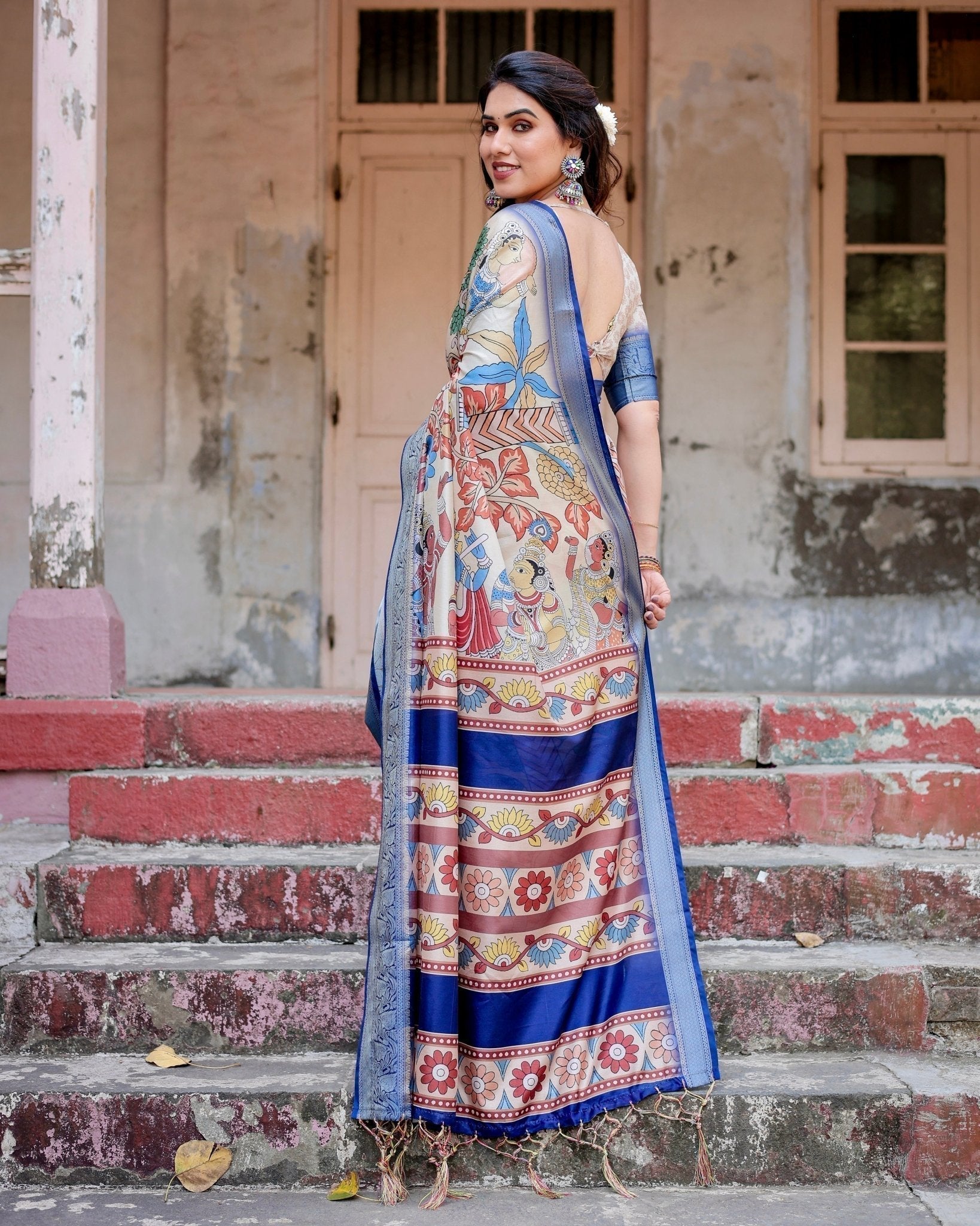 Multicolor Tussar Silk Saree with Artistic Floral Motifs and Traditional Blue Zari Border