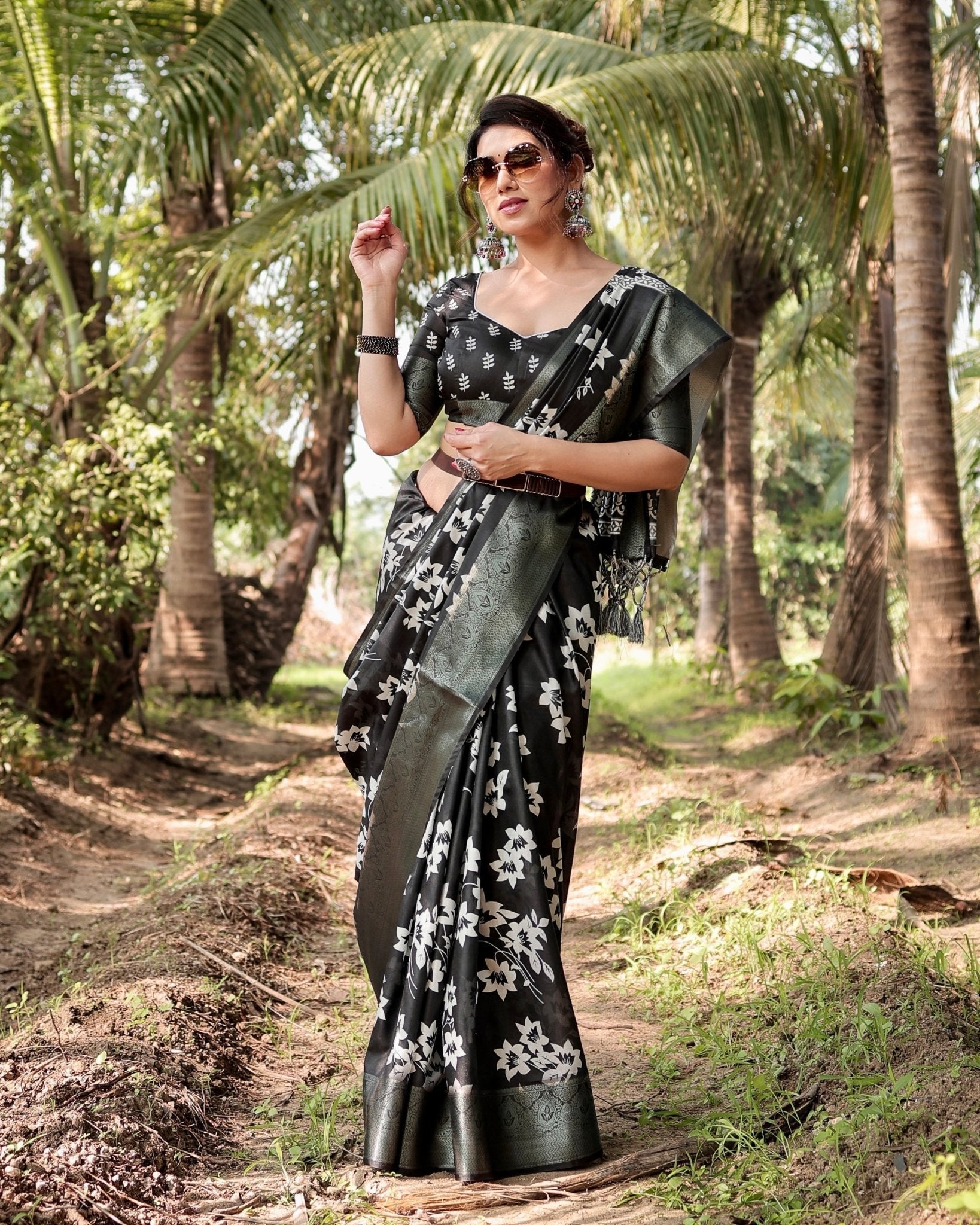 Elegant Black Tussar Silk Saree with Zari Embellished Border and Bold Floral Pallu