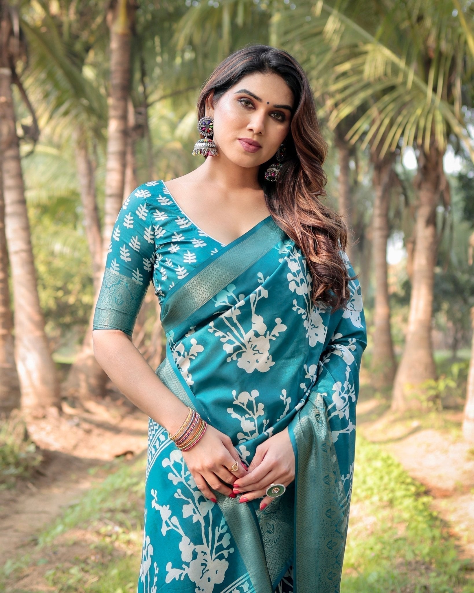 Teal Blue Tussar Silk Saree with White Floral Design, Gold Zari Border & Tassel Pallu