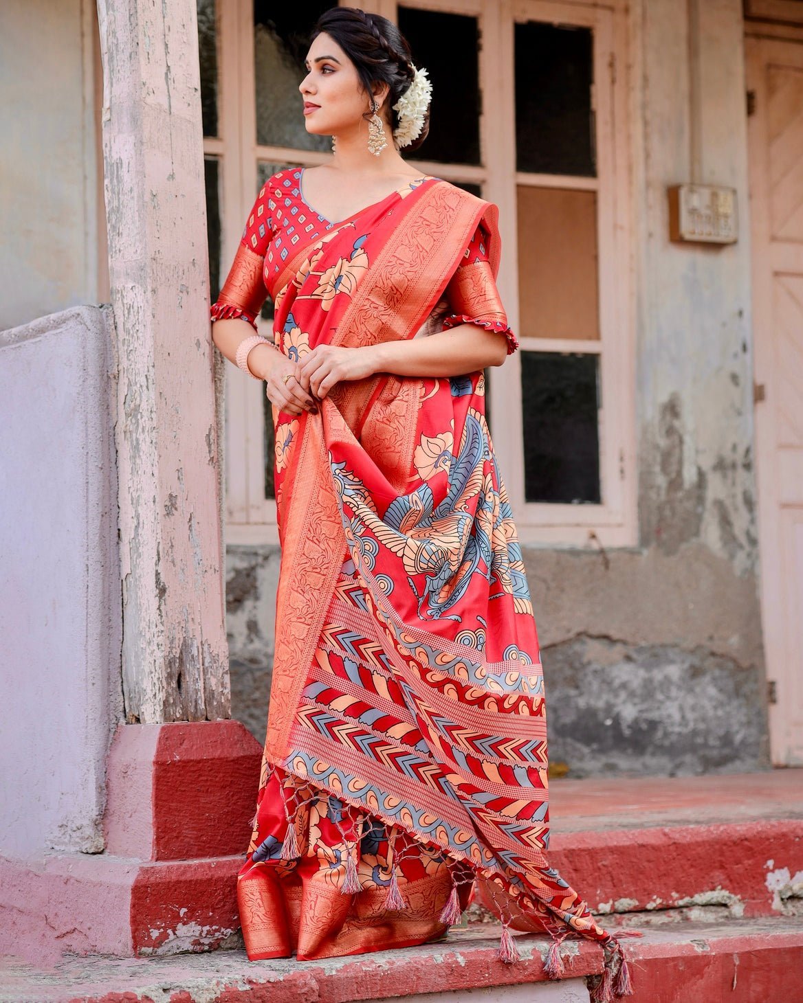 Vibrant Red Tussar Silk Saree with Bold Floral Motifs and Chevron Patterned Pallu