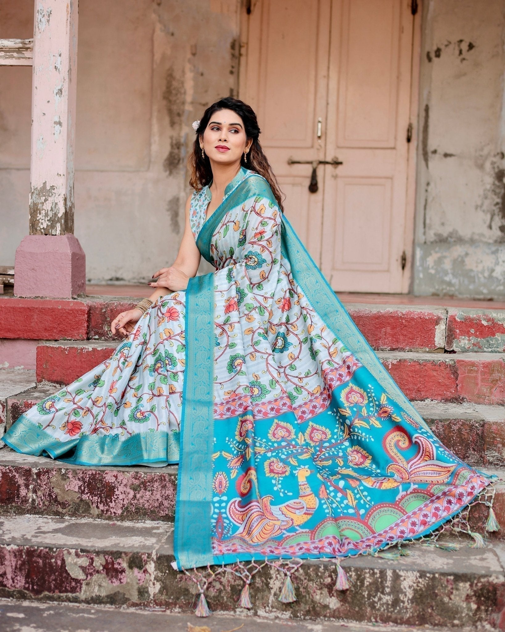 Sky Blue Tussar Silk Saree with Multicolor Floral Design and Zari Paisley Border