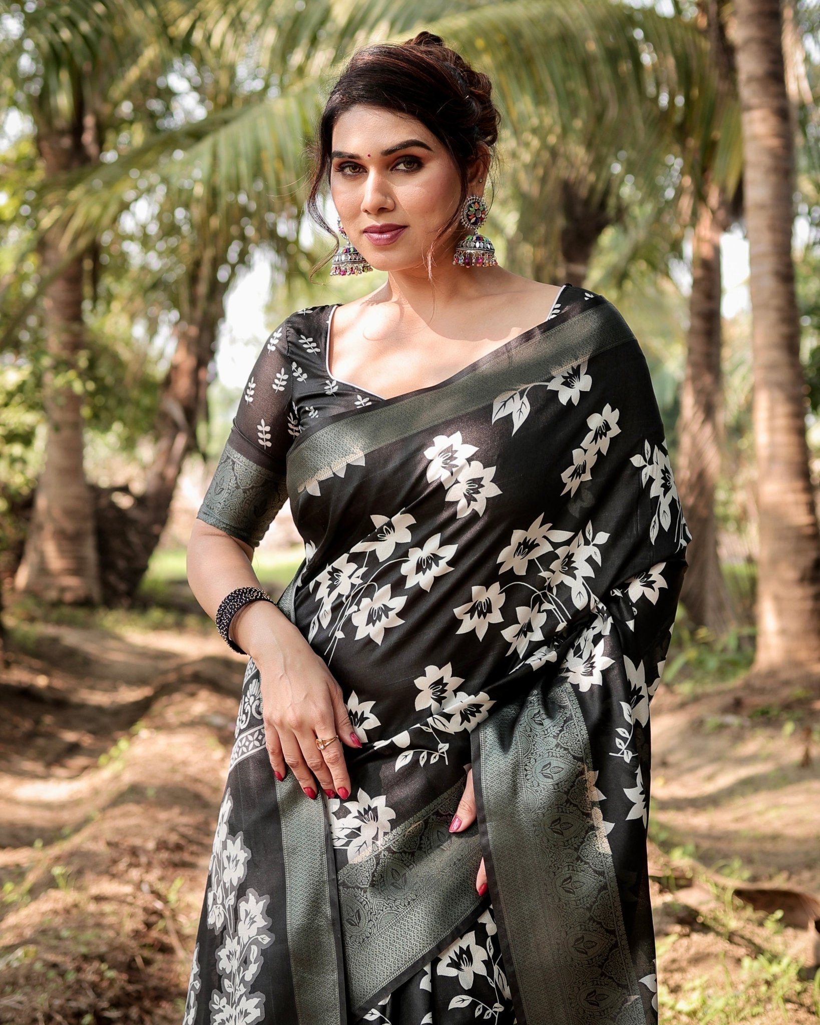 Elegant Black Tussar Silk Saree with Zari Embellished Border and Bold Floral Pallu
