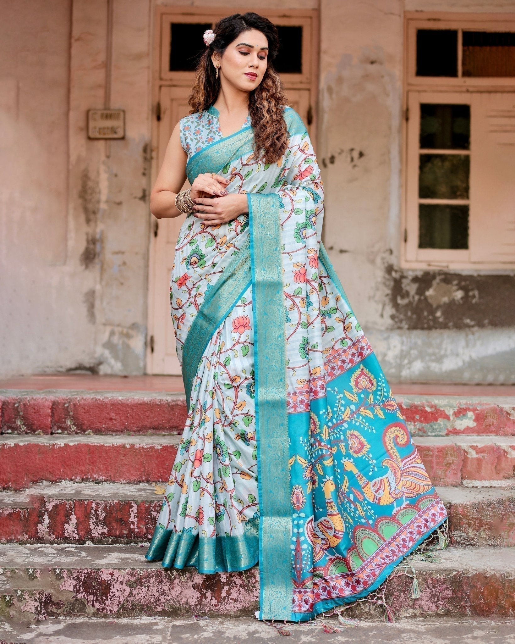 Sky Blue Tussar Silk Saree with Multicolor Floral Design and Zari Paisley Border