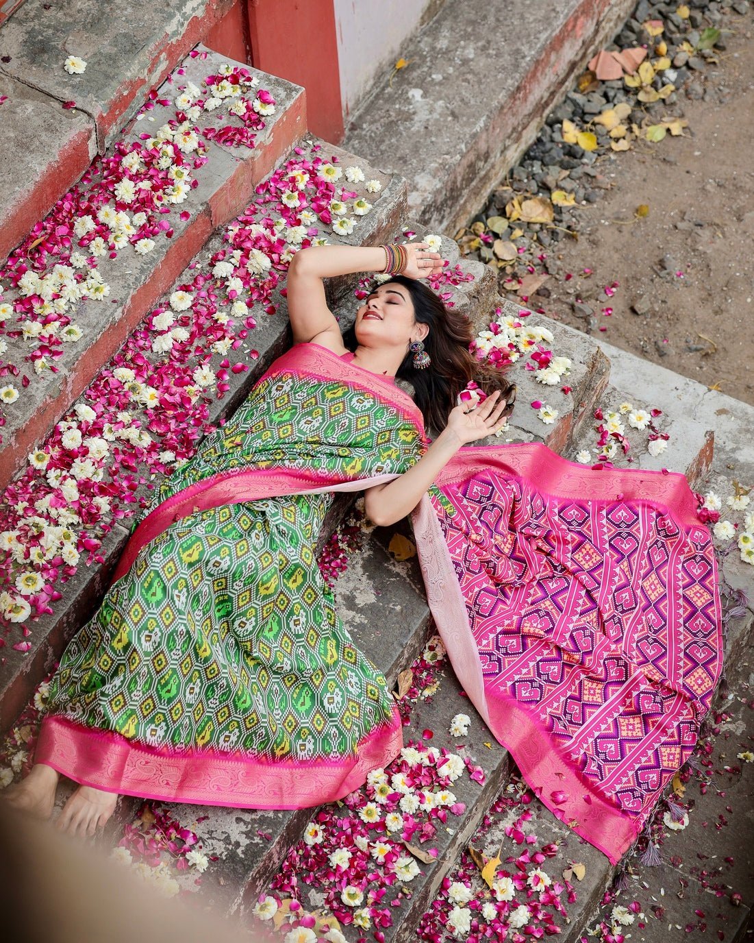 Green and Pink Tussar Silk Saree with Vibrant Ikat Patterns and Zari Border