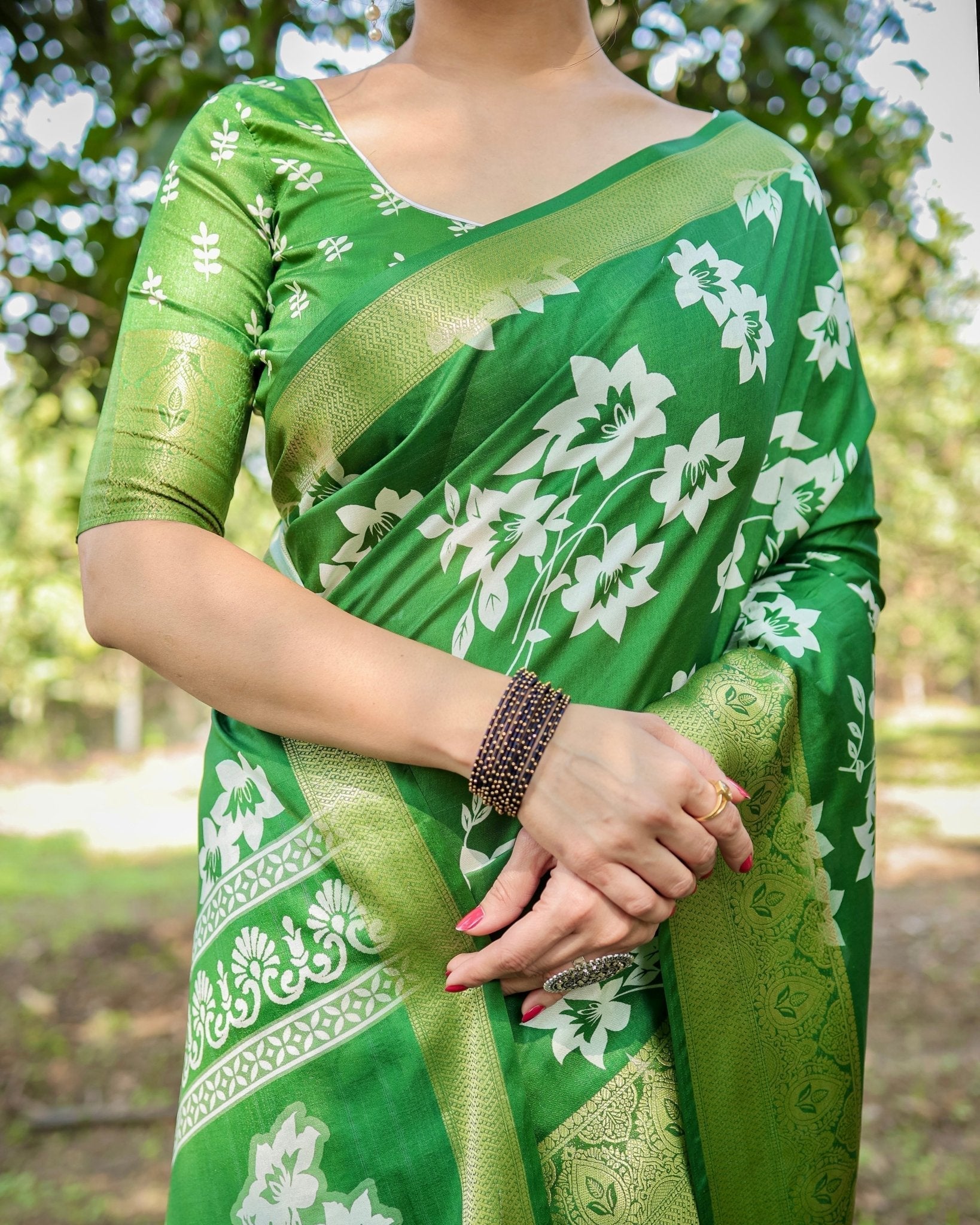 Enchanting Green Tussar Silk Saree with White Floral Prints and Zari Border