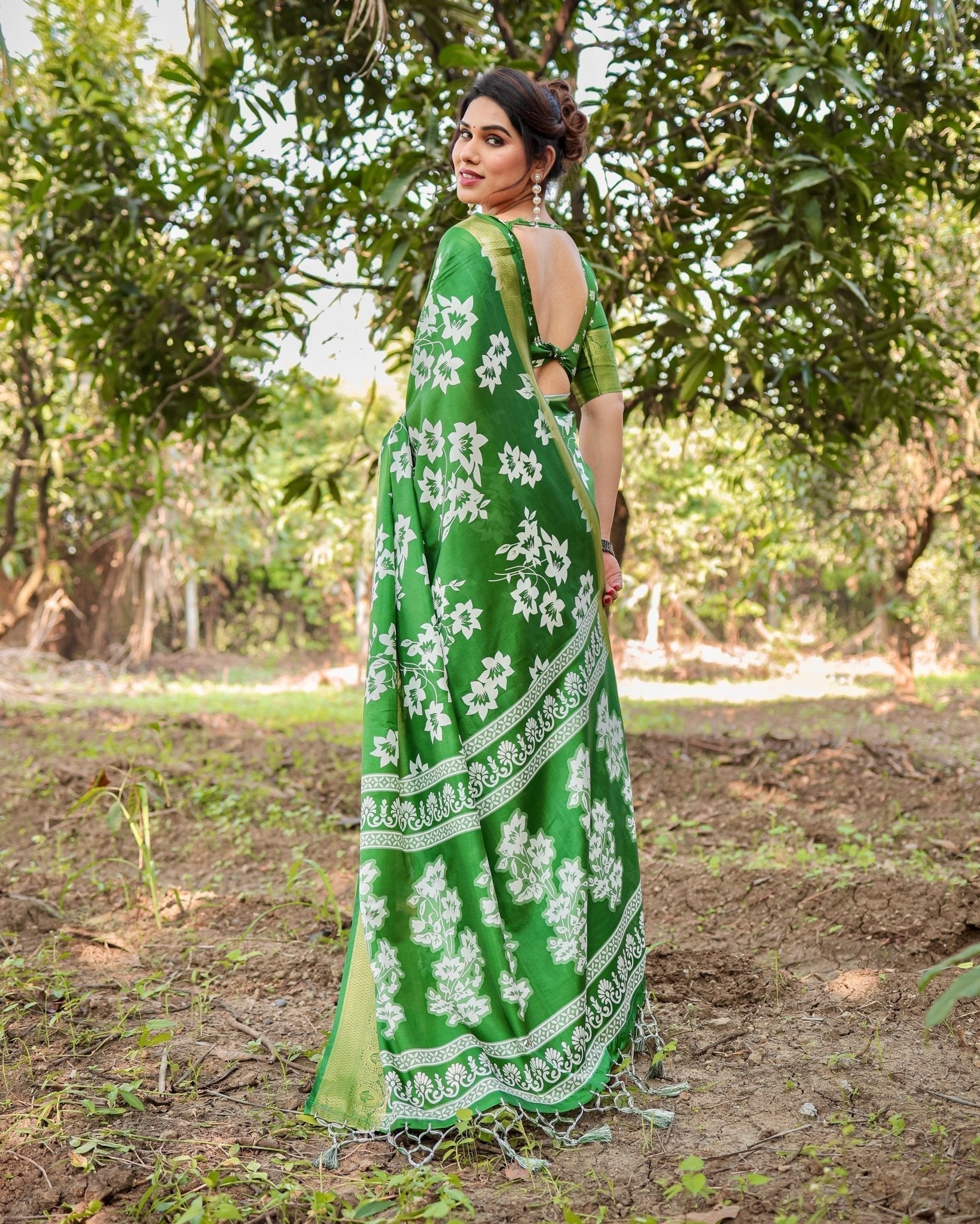 Enchanting Green Tussar Silk Saree with White Floral Prints and Zari Border