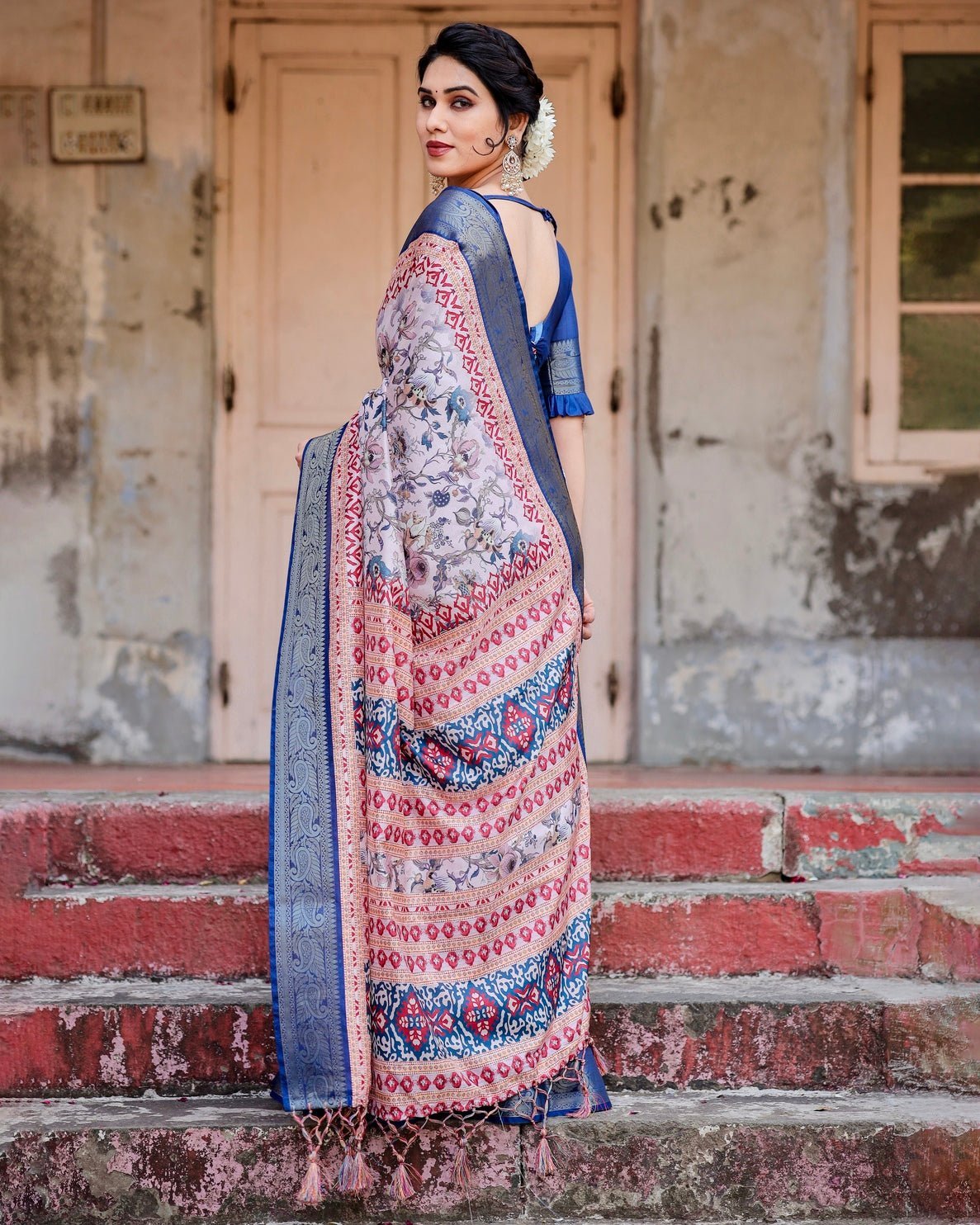 Ivory and Navy Blue Tussar Silk Saree with Floral Elegance and Ornamental Zari Work
