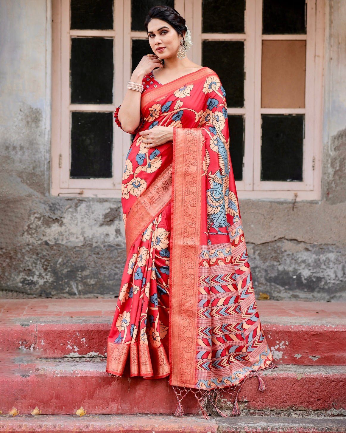 Vibrant Red Tussar Silk Saree with Bold Floral Motifs and Chevron Patterned Pallu