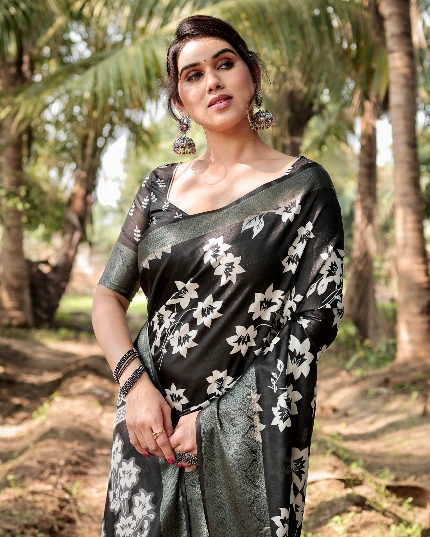 Elegant Black Tussar Silk Saree with Zari Embellished Border and Bold Floral Pallu