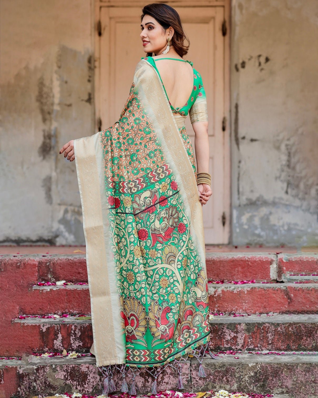Emerald Green and Gold Tussar Silk Saree with Floral and Ornamental Motifs