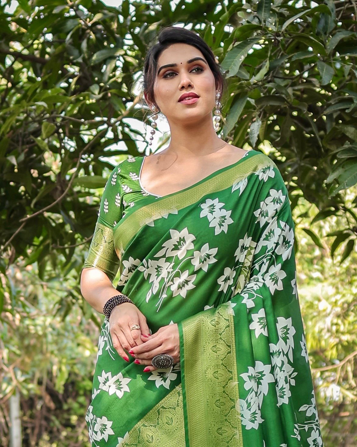 Enchanting Green Tussar Silk Saree with White Floral Prints and Zari Border