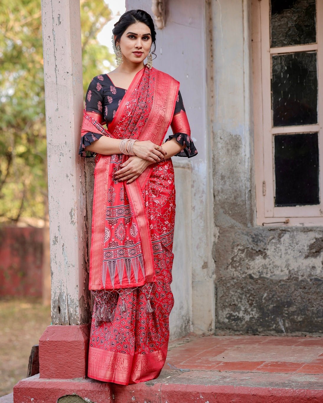 Fiery Red Tussar Silk Saree with Ornamental Motifs and Detailed Zari Pallu