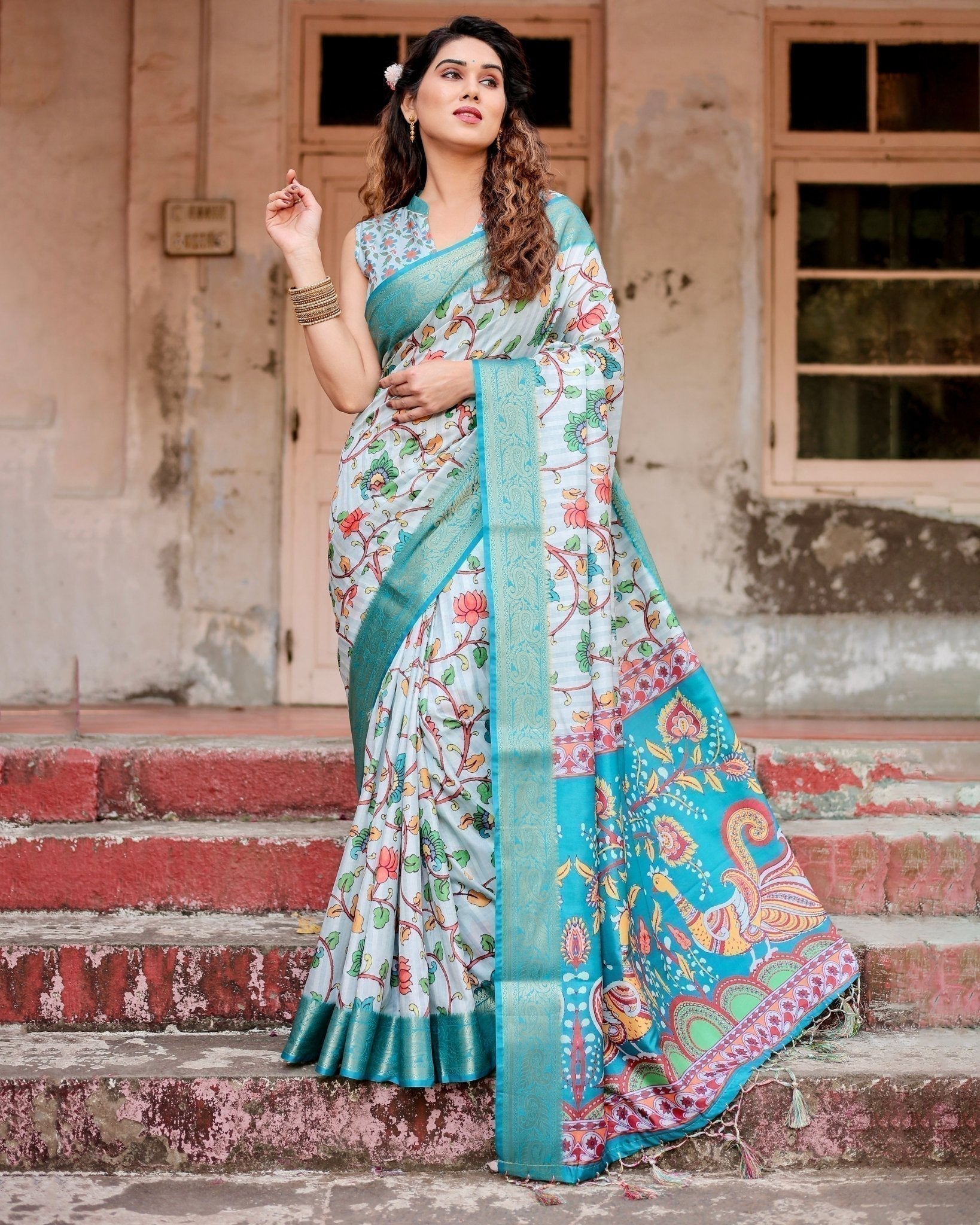 Sky Blue Tussar Silk Saree with Multicolor Floral Design and Zari Paisley Border