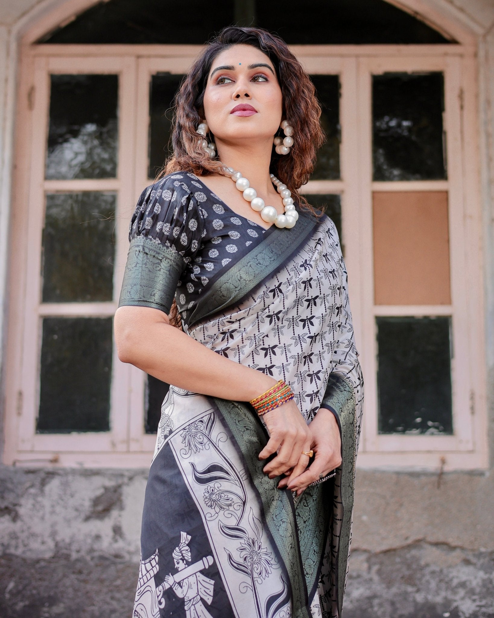 Monochrome White and Black Tussar Silk Saree with Tribal Art Motifs and Zari Border
