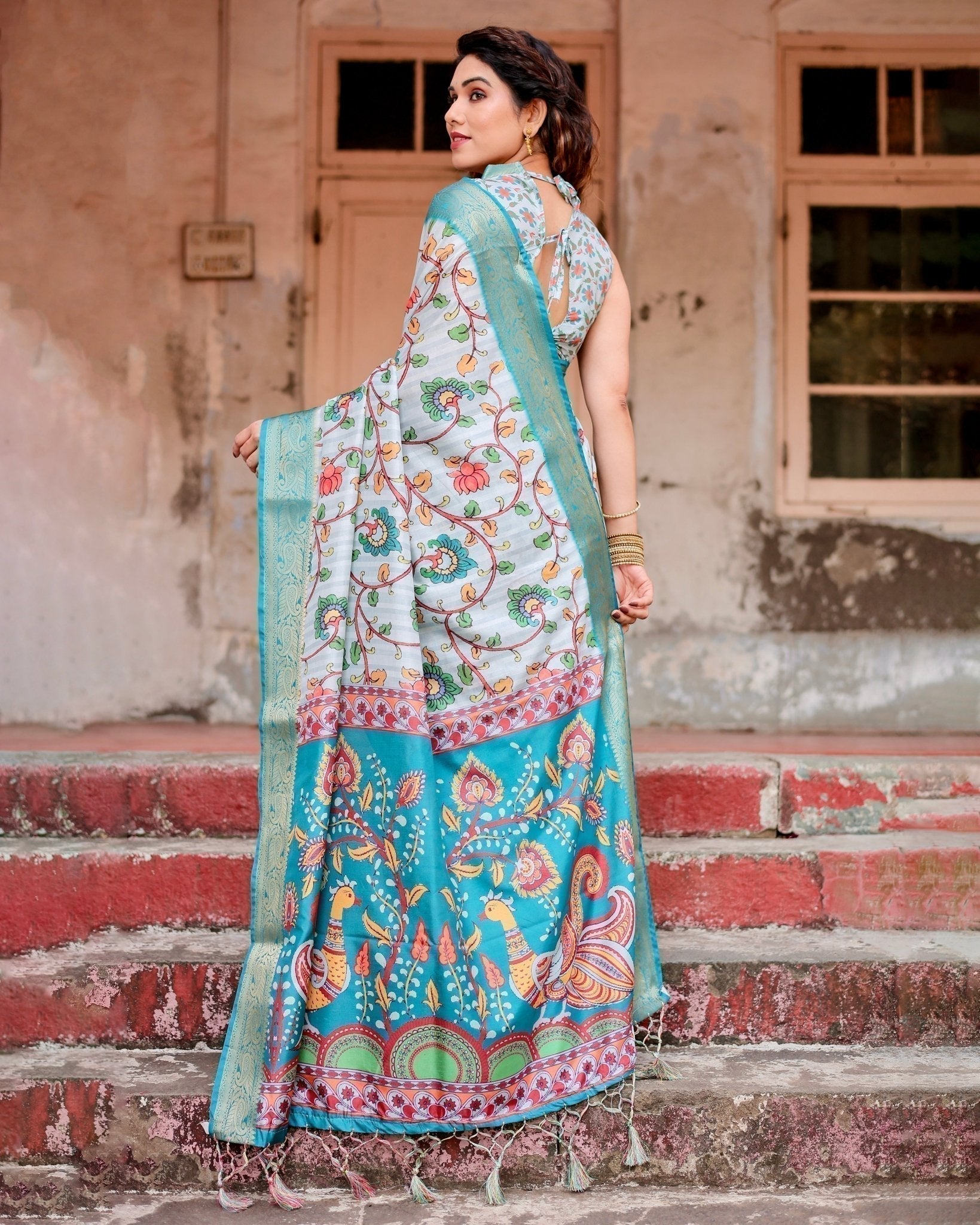 Sky Blue Tussar Silk Saree with Multicolor Floral Design and Zari Paisley Border