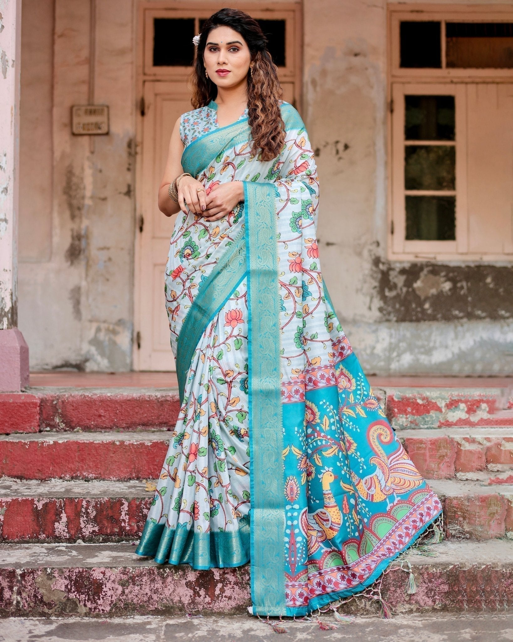Sky Blue Tussar Silk Saree with Multicolor Floral Design and Zari Paisley Border