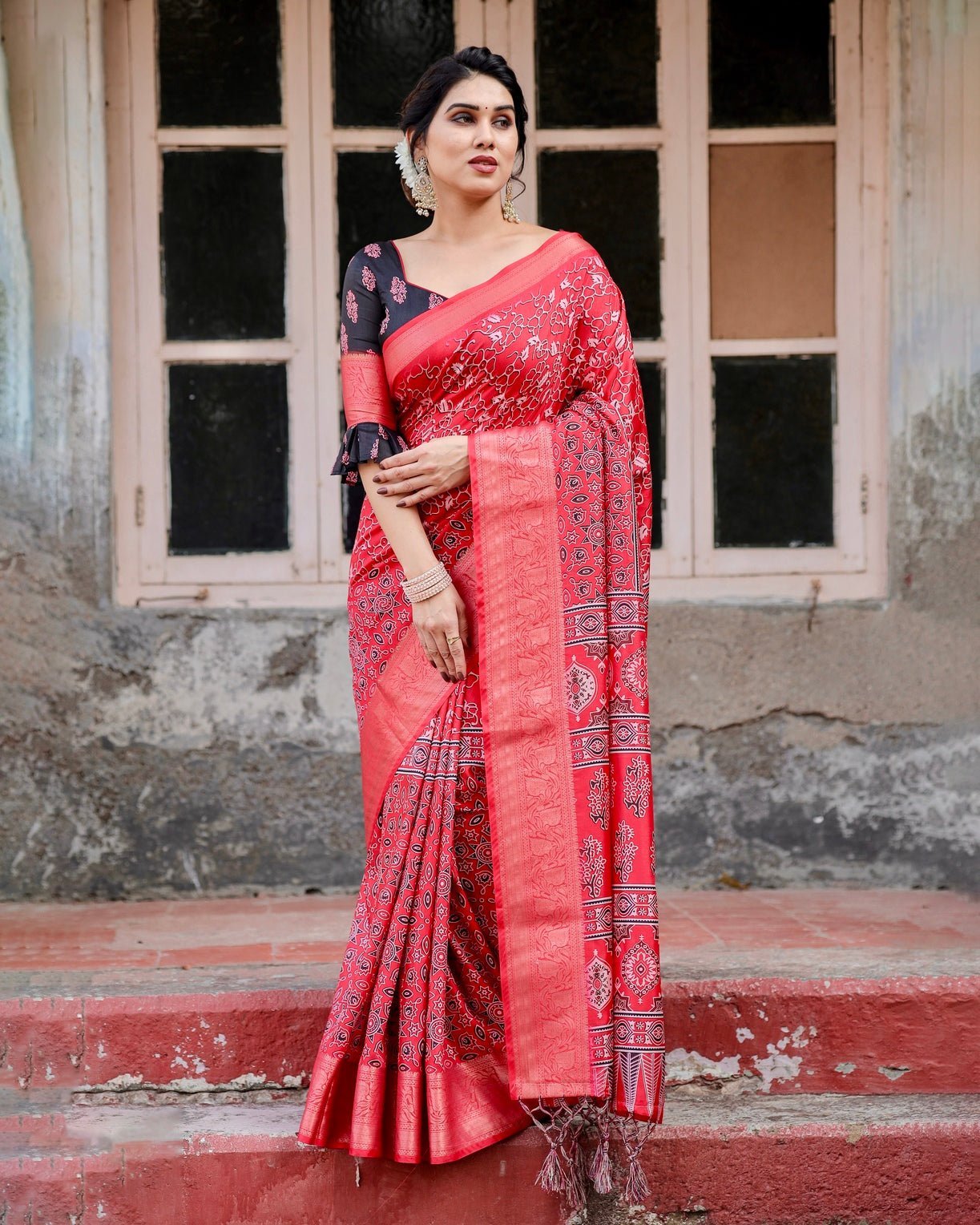 Fiery Red Tussar Silk Saree with Ornamental Motifs and Detailed Zari Pallu