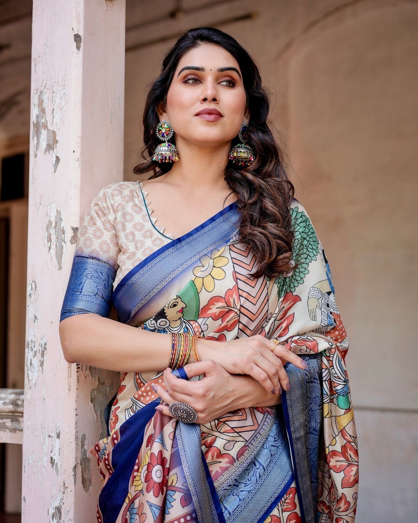 Multicolor Tussar Silk Saree with Artistic Floral Motifs and Traditional Blue Zari Border