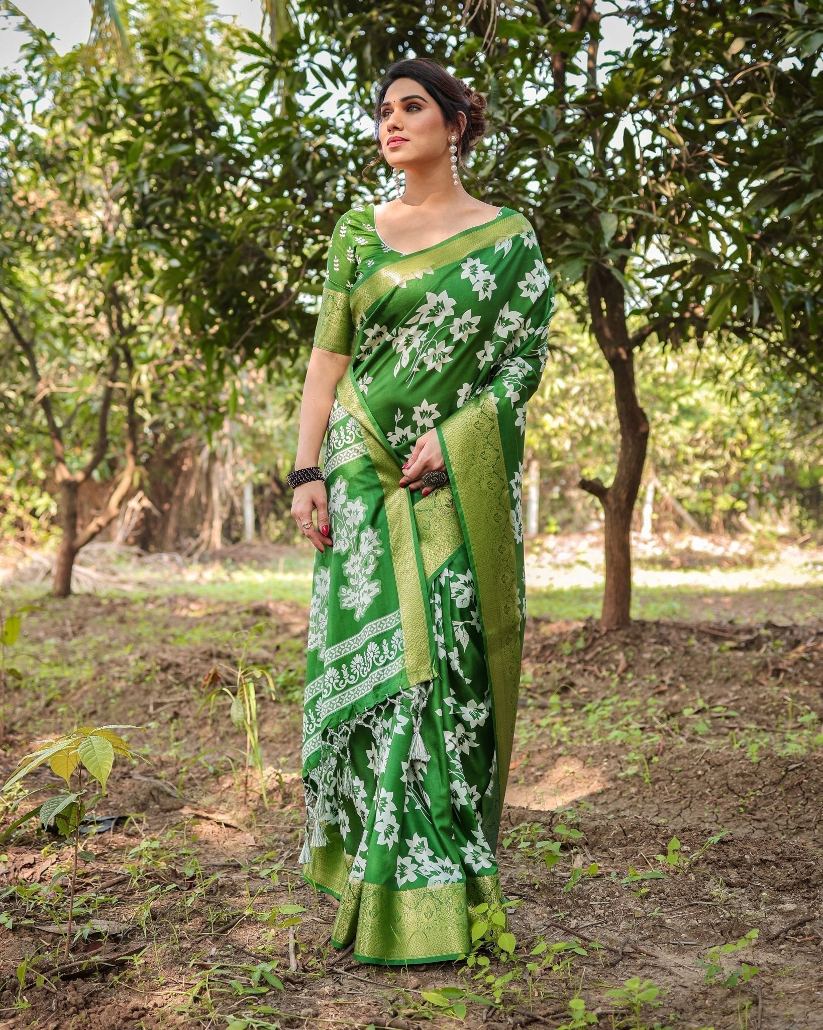 Enchanting Green Tussar Silk Saree with White Floral Prints and Zari Border