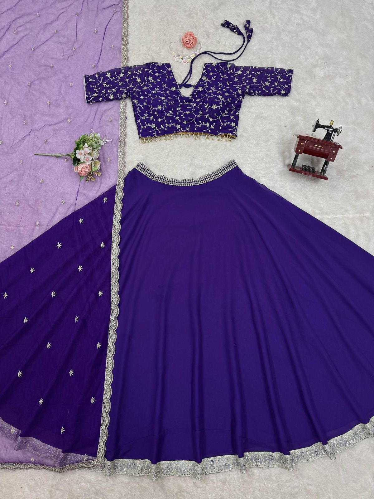 Purple Glamorous Faux Georgette Semi-Stitched Lehenga Choli with Butterfly Net Dupatta