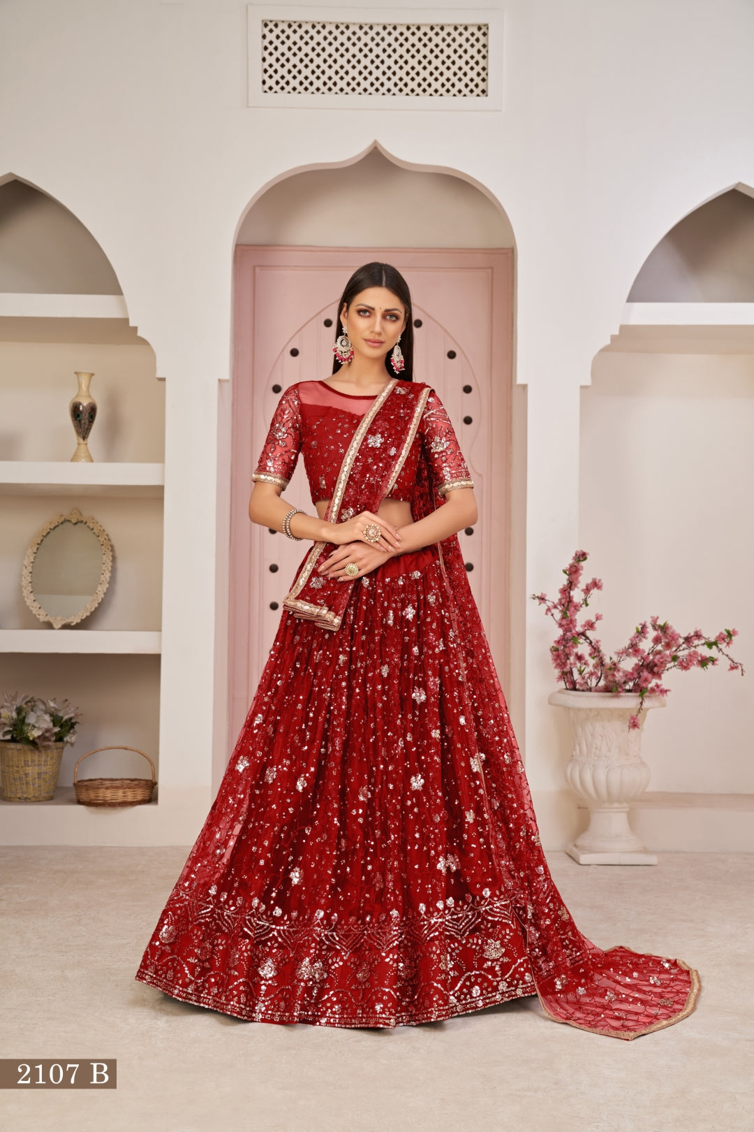 Red Luxurious Butterfly Net Lehenga with All-Over Embroidery