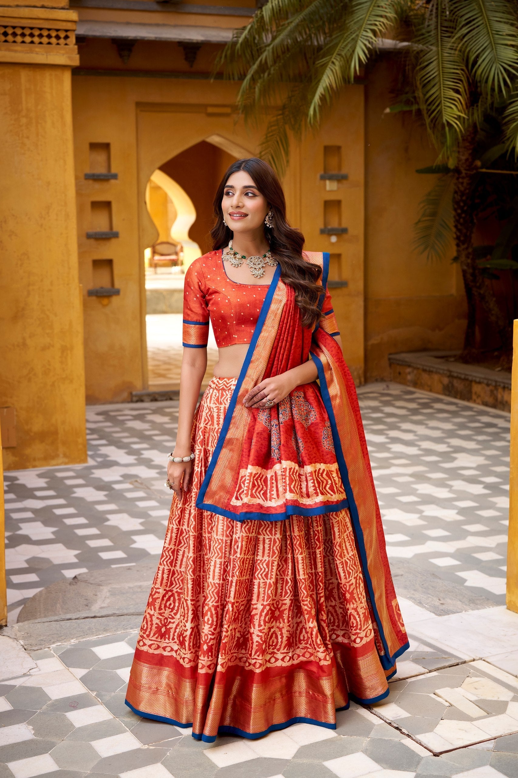 Rust Dola Silk Batik Print Lehenga Choli Set with Zari Weaving & Matching Dupatta – Fully Stitched Designer Ethnic Wear
