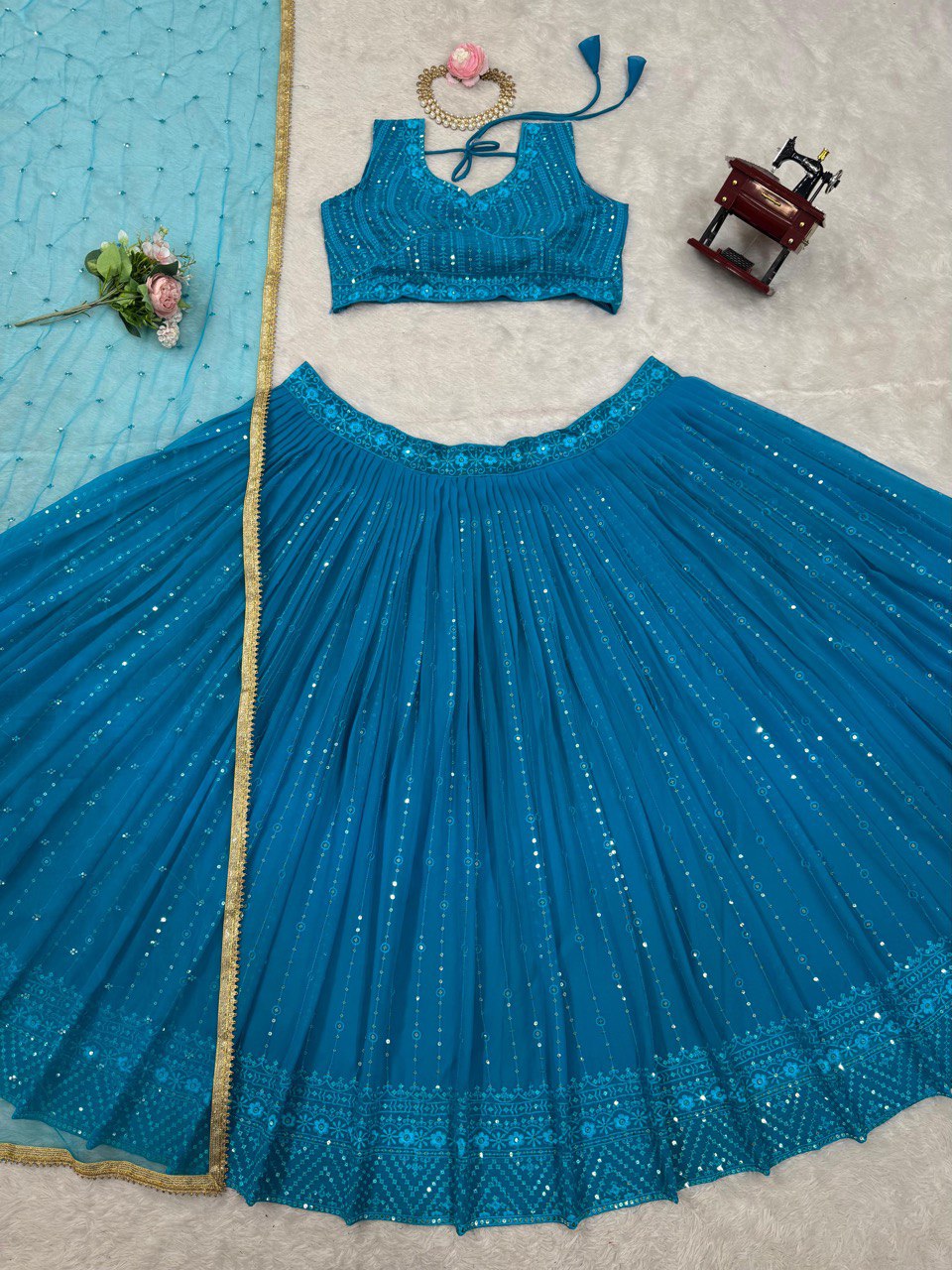 Sky Blue Elegant Fox Georgette Semi-Stitched Lehenga Set with Sequin Embroidery & Butterfly Net Dupatta