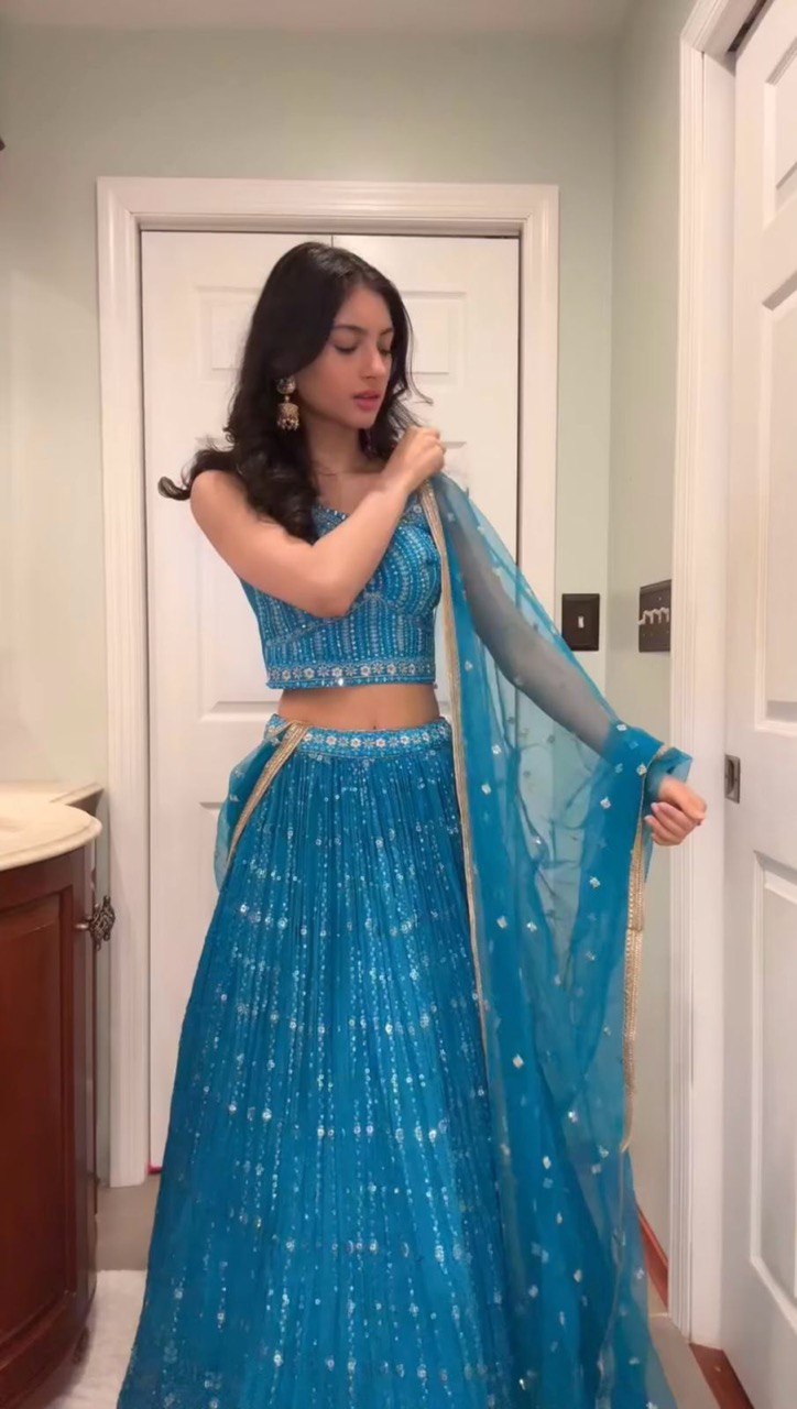 Sky Blue Elegant Fox Georgette Semi-Stitched Lehenga Set with Sequin Embroidery & Butterfly Net Dupatta