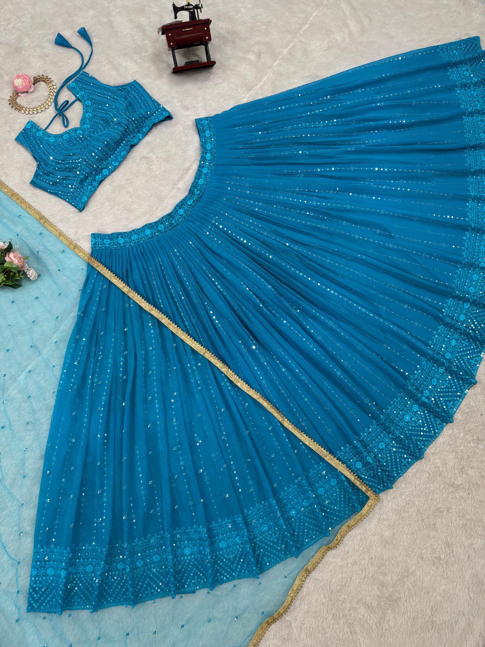 Sky Blue Elegant Fox Georgette Semi-Stitched Lehenga Set with Sequin Embroidery & Butterfly Net Dupatta
