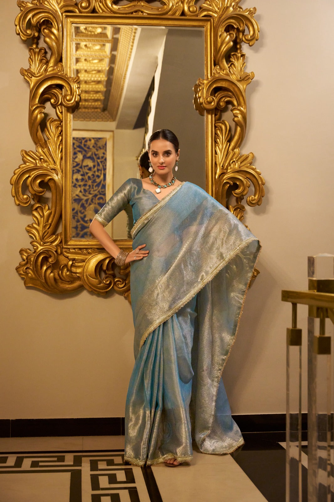 Sky Blue Elegant Tissue Shimmer Saree with Zari Weaving and Sequins Lace Border