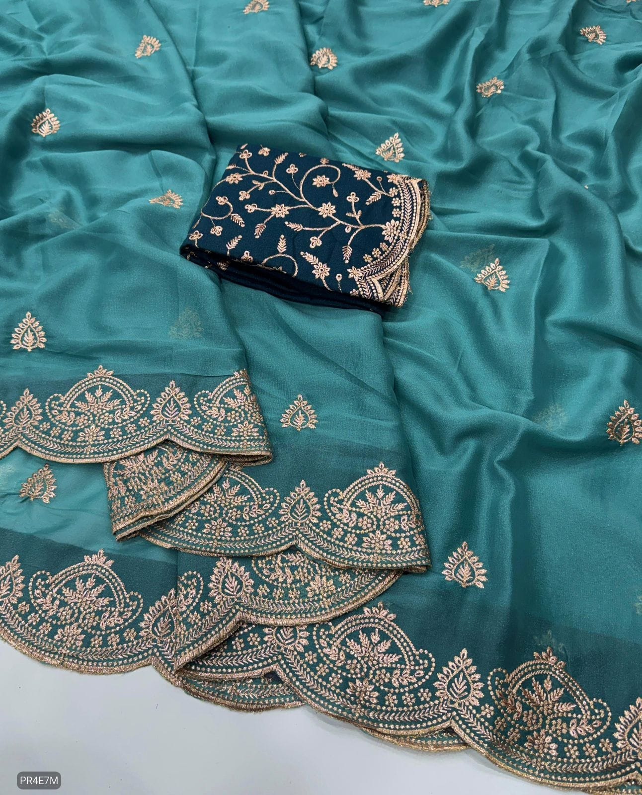 Star Georgette Saree with Embroidery Work & Contrast Blouse