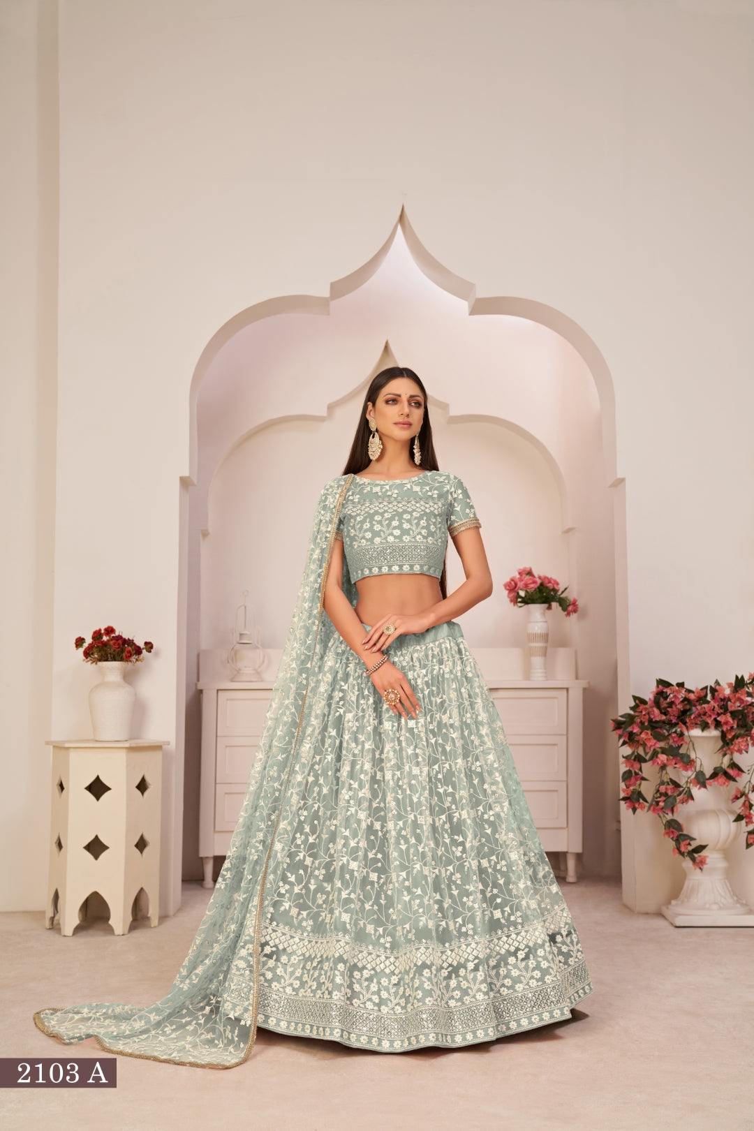Turquolse Green Elegant Butterfly Net Lehenga with Intricate Embroidery