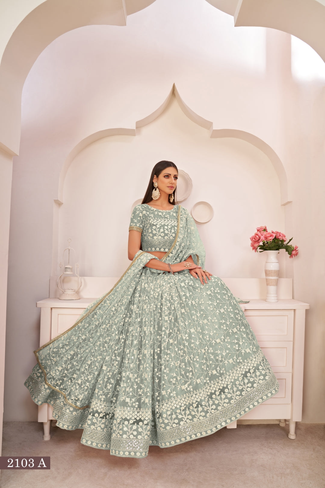 Turquolse Green Elegant Butterfly Net Lehenga with Intricate Embroidery