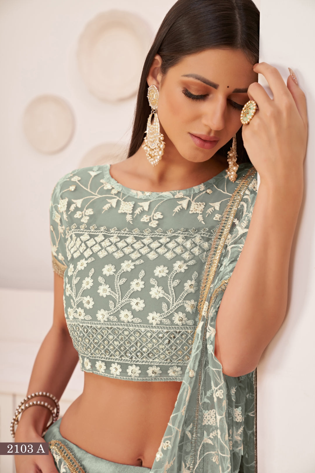 Turquolse Green Elegant Butterfly Net Lehenga with Intricate Embroidery