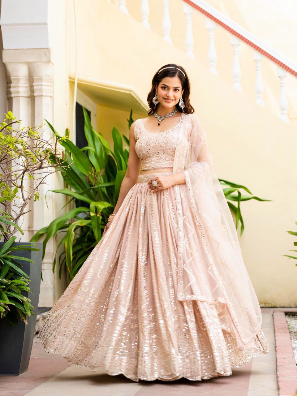 Warm Peach Luxurious Faux Georgette Zari & Sequin Embroidered Semi-Stitched Lehenga Choli with Net Embroidered Dupatta