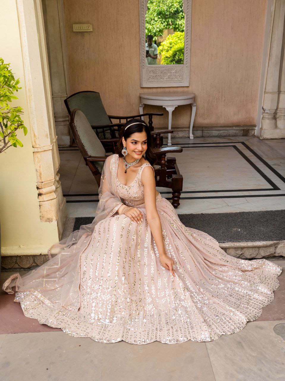 Warm Peach Luxurious Faux Georgette Zari & Sequin Embroidered Semi-Stitched Lehenga Choli with Net Embroidered Dupatta