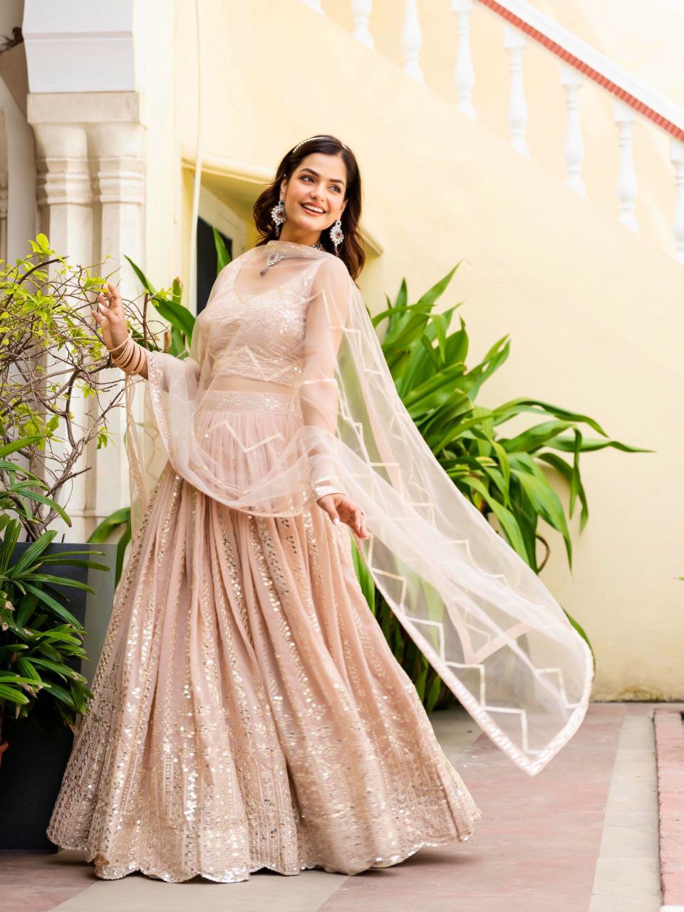 Warm Peach Luxurious Faux Georgette Zari & Sequin Embroidered Semi-Stitched Lehenga Choli with Net Embroidered Dupatta