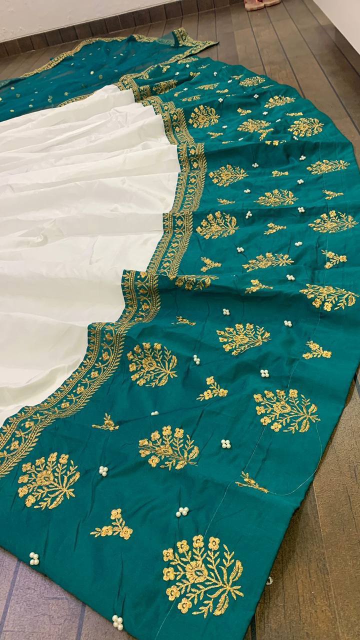 White Elegant Tapeta Silk Lehenga with Pearl & Embroidery Work