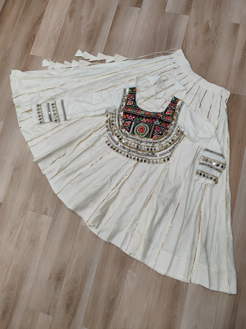 White Navratri Special Roman Fabric Lehenga Choli with Kutchi Gamthi & Mirror Work