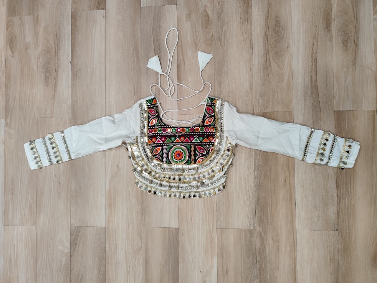 White Navratri Special Roman Fabric Lehenga Choli with Kutchi Gamthi & Mirror Work