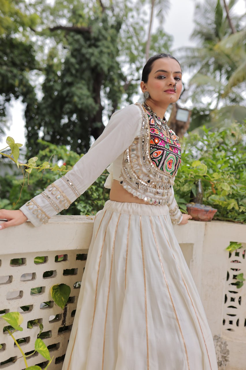 White Navratri Special Roman Fabric Lehenga Choli with Kutchi Gamthi & Mirror Work