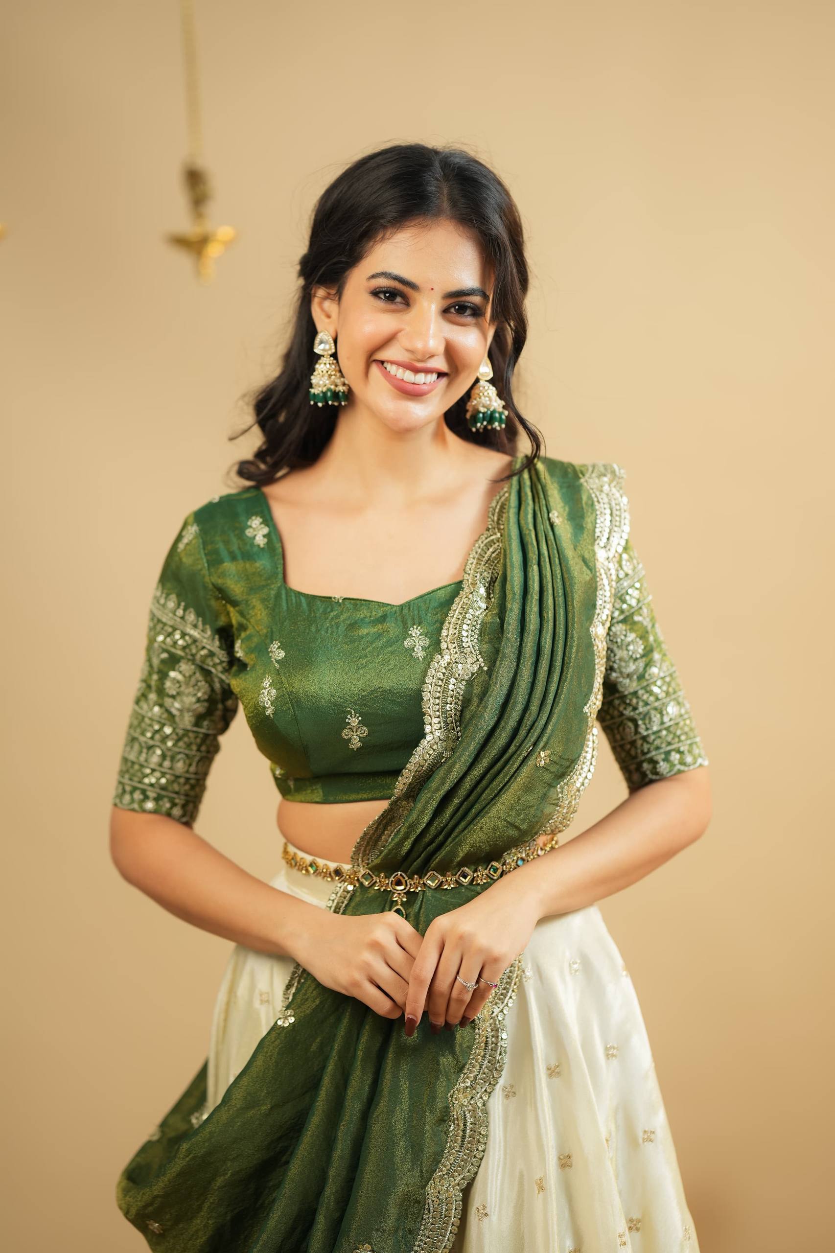 White Pure Crepe Silk Lehenga with Sequins & Zari Work and Shimmer Silk Green Dupatta