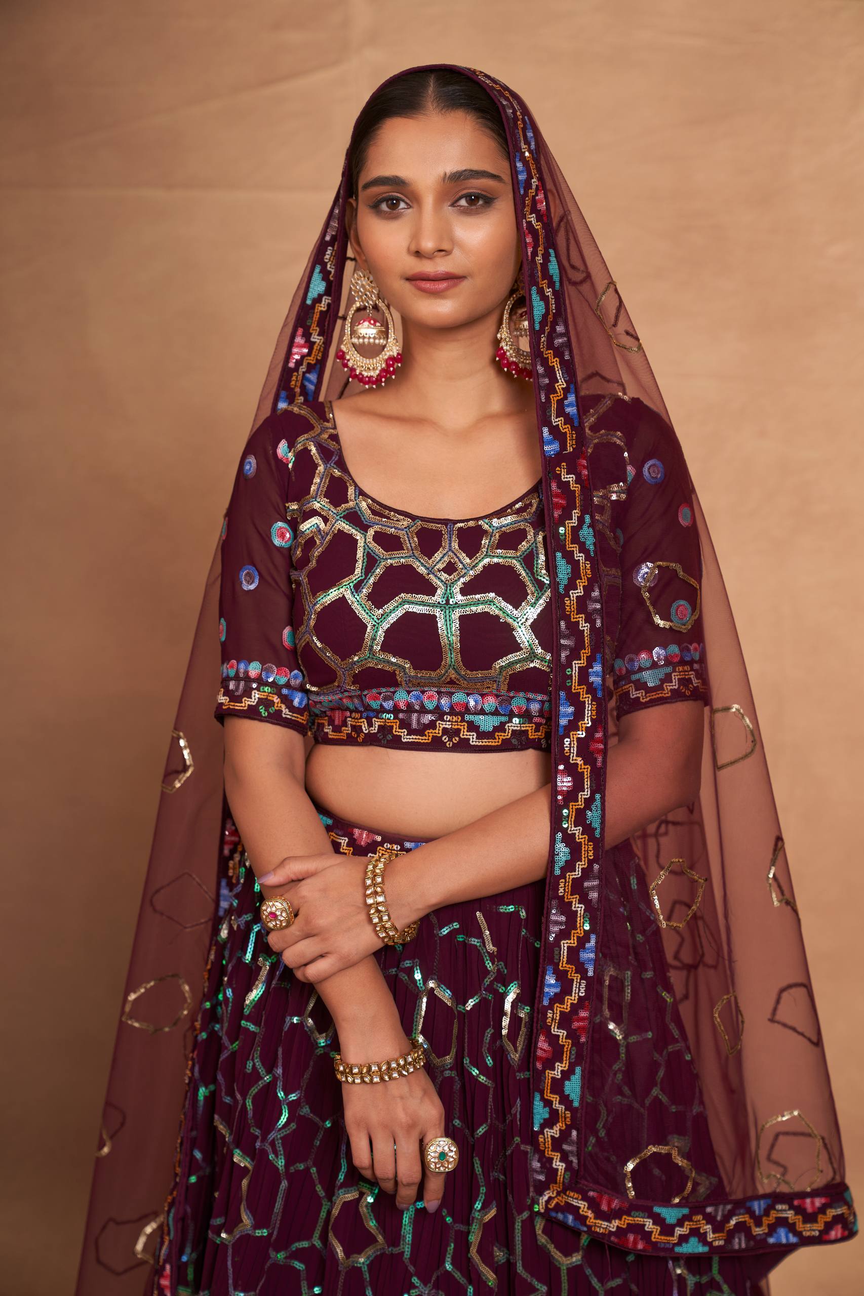 Wine Heavy Georgette Embroidered Lehenga Choli Set with Sequins & Net Dupatta