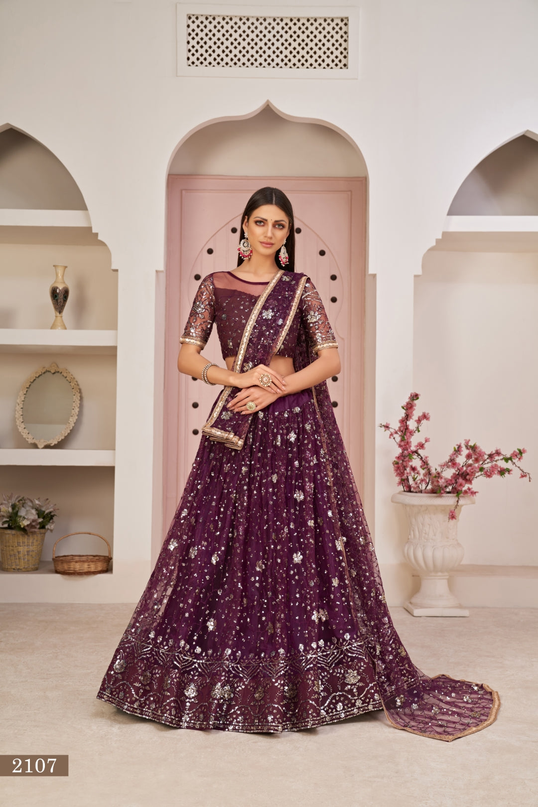 Wine Luxurious Butterfly Net Lehenga with All-Over Embroidery